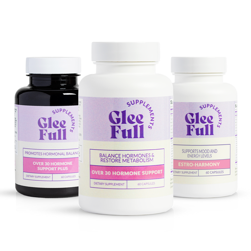 One bottle each of GleeFull Over 30 Hormone Support Plus (dark amber), Over 30 Hormone Support (white), and Estro-Harmony (white) on white podiums against a burgundy background. Purple banner reads: 'Total Hormone Rebalance To End Hot Flashes & Melt Fat'. 